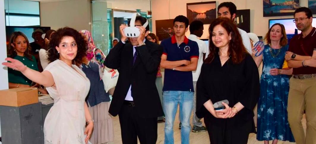 Bassam Radi, Egypt's Ambassador to Italy, trying the CLAP FOR ME installation with a VR headset in Rome